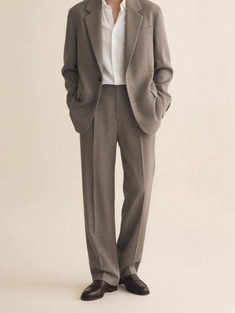 Illustration: eased-shoulder soft blazer and unbroken pant line